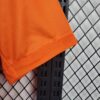 camiseta real madrid naranja manga