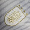 CAMISETA URUGUAY 24 COPA AMERICA SEGUNDA EQUIPACIÓN ESCUDO