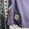 PANTALON CORTO INGLATERRA SEGUNDA EQUIPACIÓN 24 25 ESCUDO