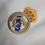 camiseta final champions real madrid escudo