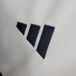 camiseta final champions real madrid logo