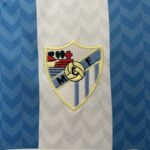camiseta malaga aniversario 120 escudo