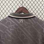 camiseta real madrid negra cuello anterio