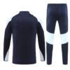 Chandal Real Madrid negro y blanco dorsal