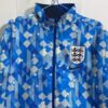 Cortavientos inglaterra color azul reversible cuello