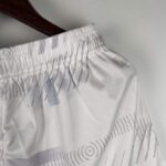 Pantalon-corto-primera-equipacion-Tottenham-2023-2024-pretina