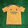 Camiseta Real Madrid segunda equipación naranja 2024/2025
