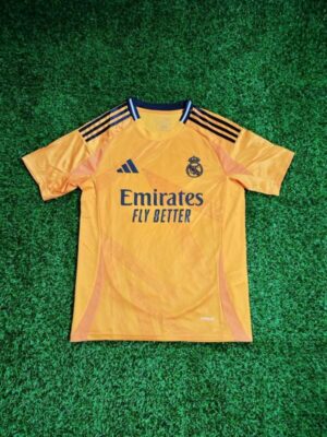 Camiseta Real Madrid segunda equipación naranja 2024/2025