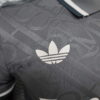 real madrid camiseta negro y blanco logo