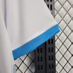 camiseta-marsella-primera-equipacion-2024-2025-puño-izquierdo