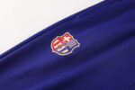 Chandal FC Barcelona Azul-Rojo 2024-2025 logo pantalon
