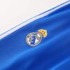 Chandal Real Madrid Blanco-Celeste 2024-2025 logo pantalon