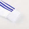Chandal Real Madrid Blanco-Celeste 2024-2025 puño