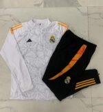 Chandal Real Madrid Blanco y Negro 2024-2025 parte delantera