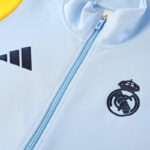 chandal-real-madrid-azul-blanco-2024-2025-pecho