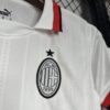 Conjunto Niño AC Milán Segunda Equipacion 2024-2025 logo