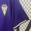 camiseta-cordoba-segunda-equipacion-2024-2025-puño-izquierdo