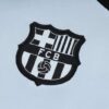 chandal-barcelona-azul-claro-2024-2025-escudo