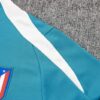 Chandal Atletico de Madrid Azul Gris 2024-2025 honbro