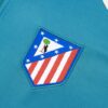 Chandal Atletico de Madrid Azul Gris 2024-2025 logo