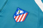 Chandal Atletico de Madrid Azul Gris 2024-2025 logo