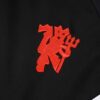 Chandal Manchester United Negro 2024-2025 logo