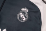 Chandal Real Madrid Gris 2024-2025 logo