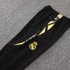 Chandal-real-madrid-negro-2024-2025-pantalon-escudo