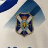 Conjunto Niño Tenerife Primera Equipación 2024-2025 logo