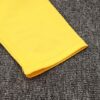 chandal-Borussia-Dortmund-amarillo-2024-2025-puño-izquierdo