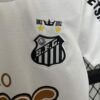 conjunto-niño-santos-primera-equipacion-2011-2012-escudo