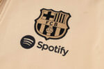 Chandal FC Barcelona con Capucha Crema 2024-2025 patrocinador