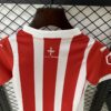 Conjunto Niño Sporting de Gijon Primera Equipacion 2024-2025 cuello