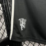 Corto Manchester United Tercera Equipación 2024-2025 logo