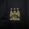 Camiseta retro Manchester United segunda equipacion 2013-2014 escudo