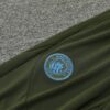 Chandal Manchester City Verde 2024-2025 escudo