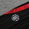 Chandal Manchester United Morado 2024-2025 escudo