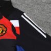 Chandal Manchester United Morado 2024-2025 hombro