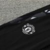Chandal Manchester United Verde 2024-2025 escudo pantalon