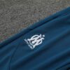 Chandal Olympique Masella Celeste 2024-2025 escudo pantalon