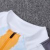 Chandal Real Madrid amarillo 2024-2025 cuello