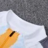 Chandal Real Madrid amarillo 2024-2025 cuello