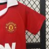 Conjunto-niño-manchester-united-primera-equipacion-retro-2010-2011-puño-izquierdo