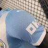 camiseta-manchester-city-primera-equipacion-2025-2026-puño-izquierdo
