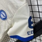 conjunto-niño-alaves-segunda-equipacion-2024-2025-puño-izquierdo