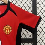 conjunto-niño-manchester-united-retro-2002-2004-puño-izquierdo