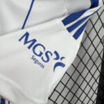 conjunto-niño-primera-equipacion-real-zaragoza-2024-2025-puño-izquierdo