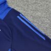Chandal Al Nassr Azul 2024-2025 hombro