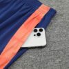 Chandal Manchester United Naranja 2024-2025 bolsillo