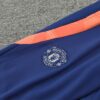 Chandal Manchester United Naranja 2024-2025 escudo